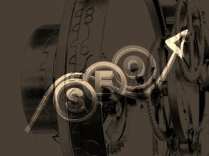 A visual image of the acronym SEO (Search Engine Optimisation) using cogs and gears and a black and gold design layout.